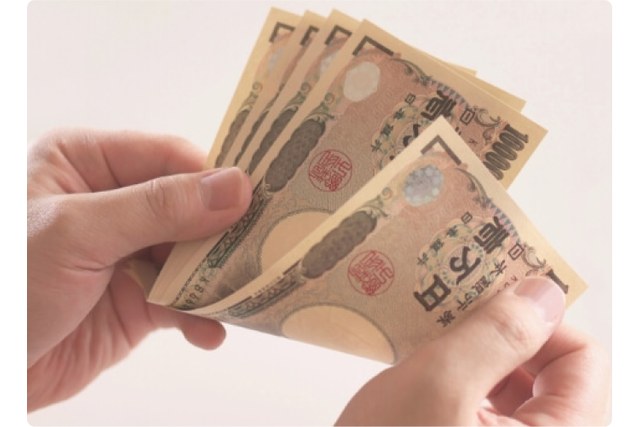 札束（円安局面でのロレックス買取イメージ）